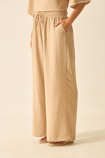 CALÇA RETA COM BOLSO E CORDINHA MARFIM