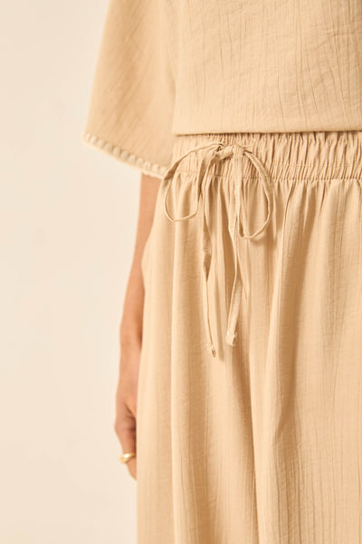 CALÇA RETA COM BOLSO E CORDINHA MARFIM