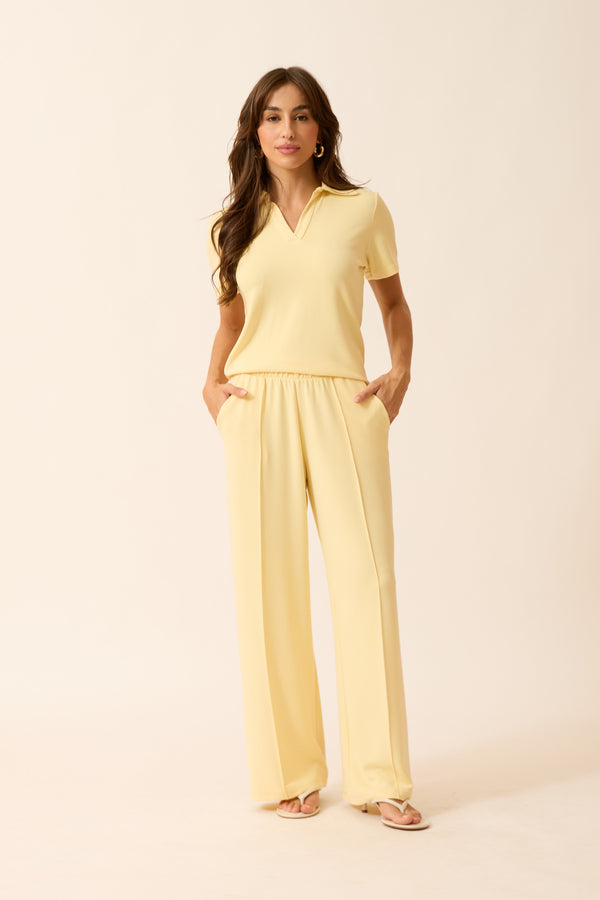 CALÇA RETA COM BOLSO MODAL GENEBRA AMARELO MANTEIGA